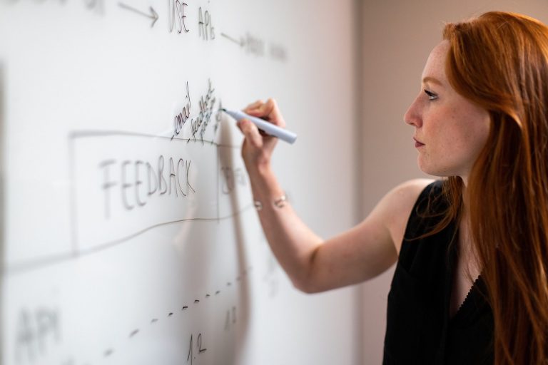 Woman facilitating a meeting 