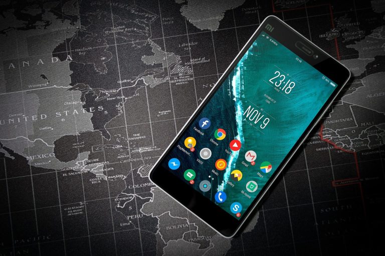 Mobile phone on world map 